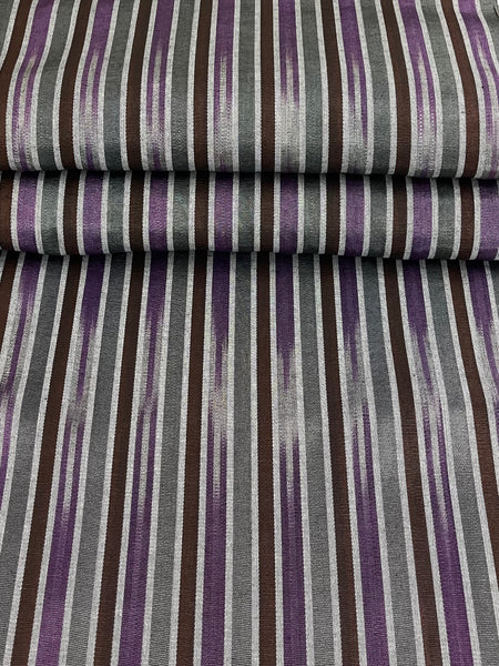 Multicolor tie-dye design woven fabric. 19.5" wide.