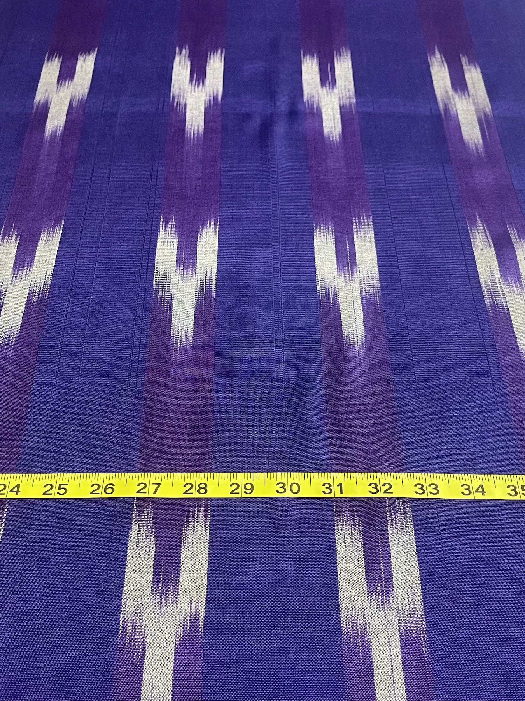 Tie-dye woven purple and white Kutnu fabric