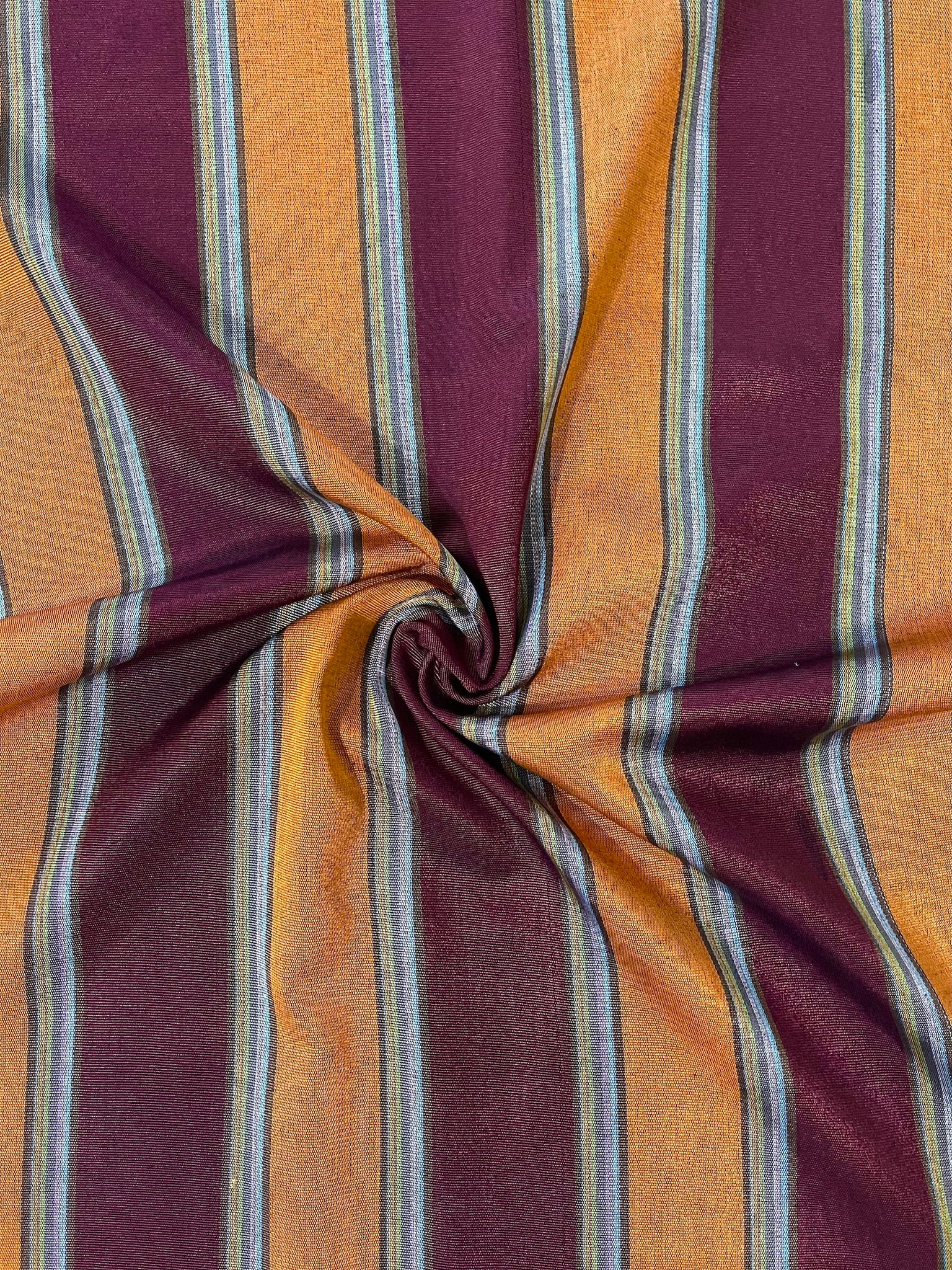 Multicolor striped shiny kutnu fabric.