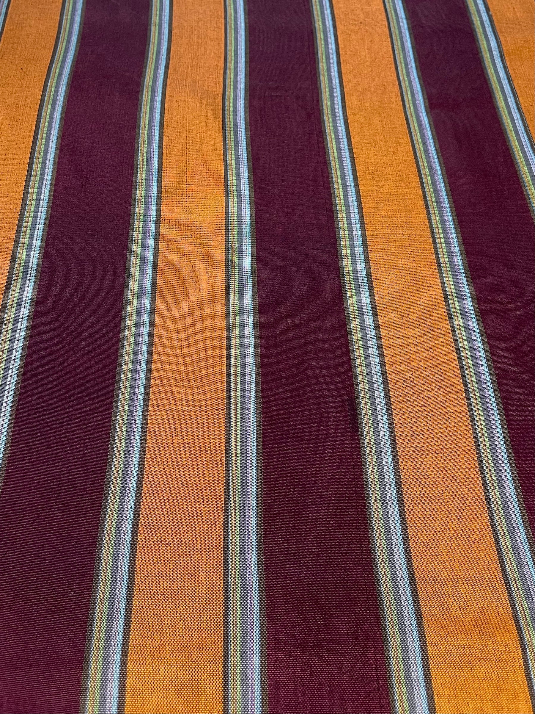 Multicolor striped shiny kutnu fabric.