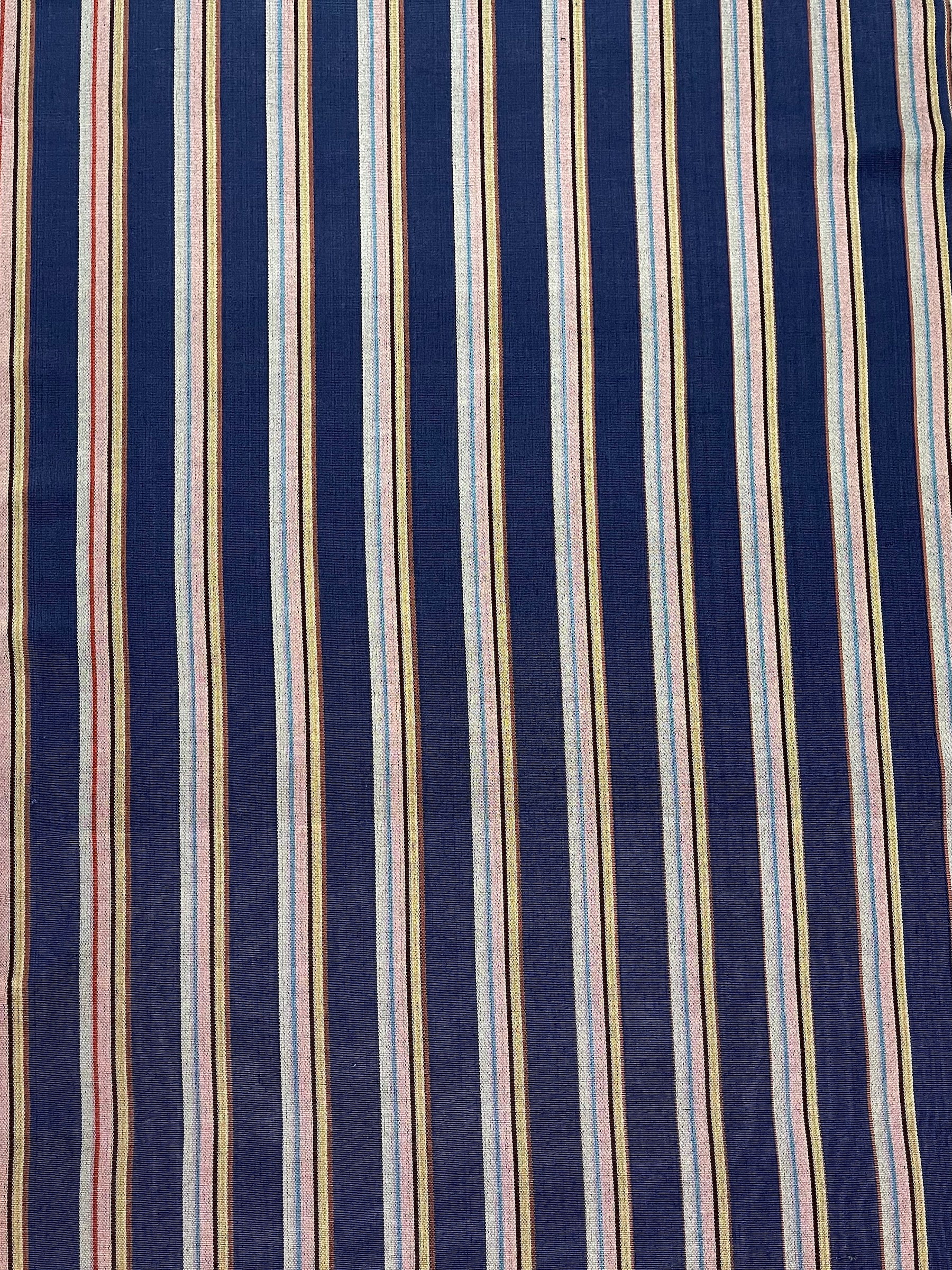 Colorful striped woven kutnu fabric.