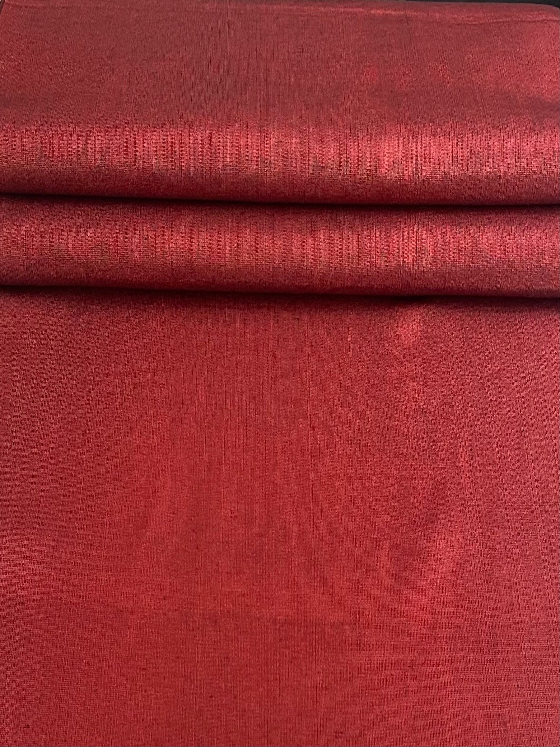 Red kutnu fabric. 19.5" wide.