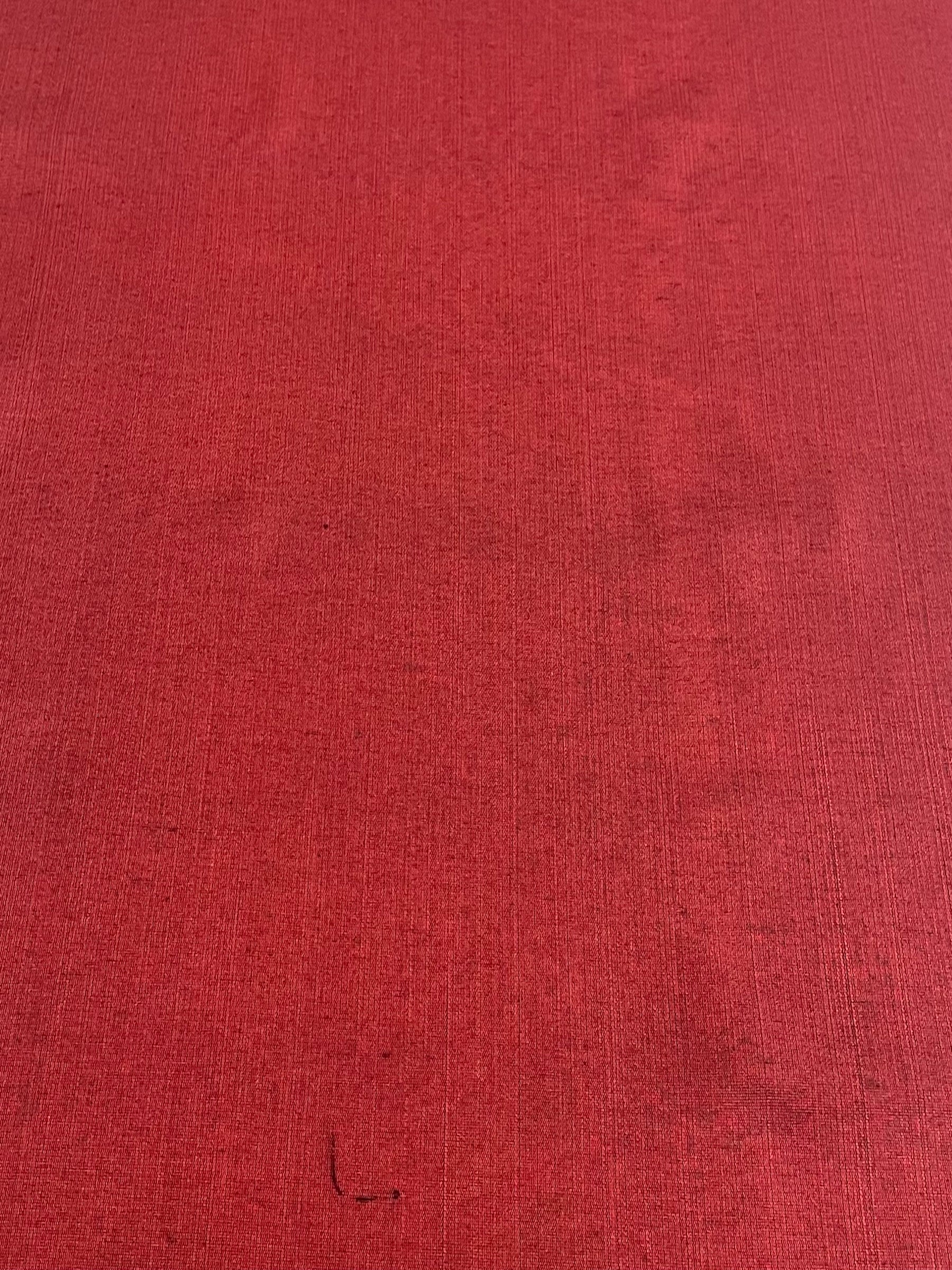 Red kutnu fabric. 19.5" wide.