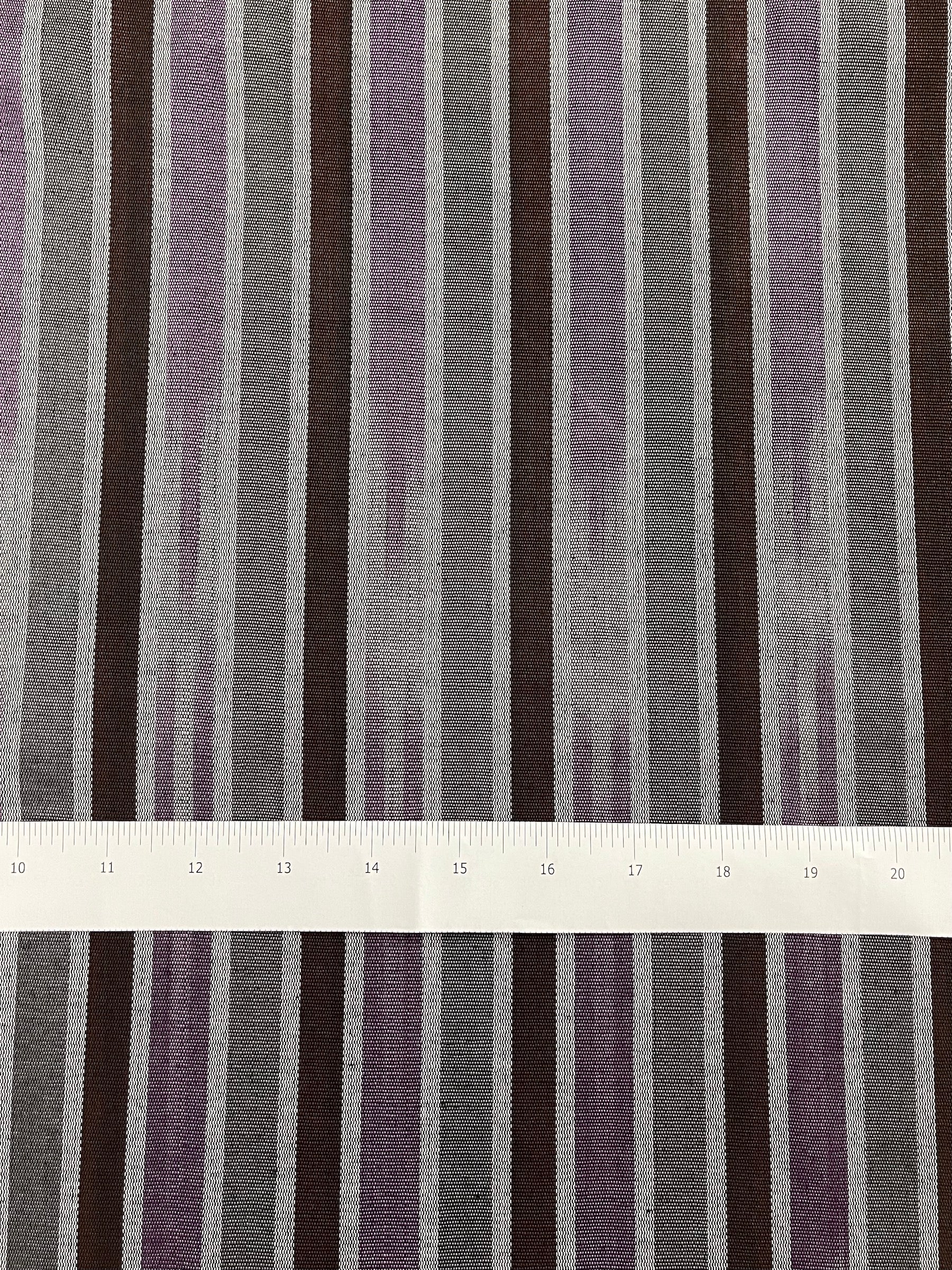 Multicolor tie-dye design woven fabric. 19.5" wide.